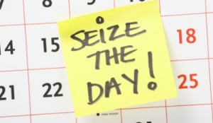 note saying seize the day stuck onto a calendar